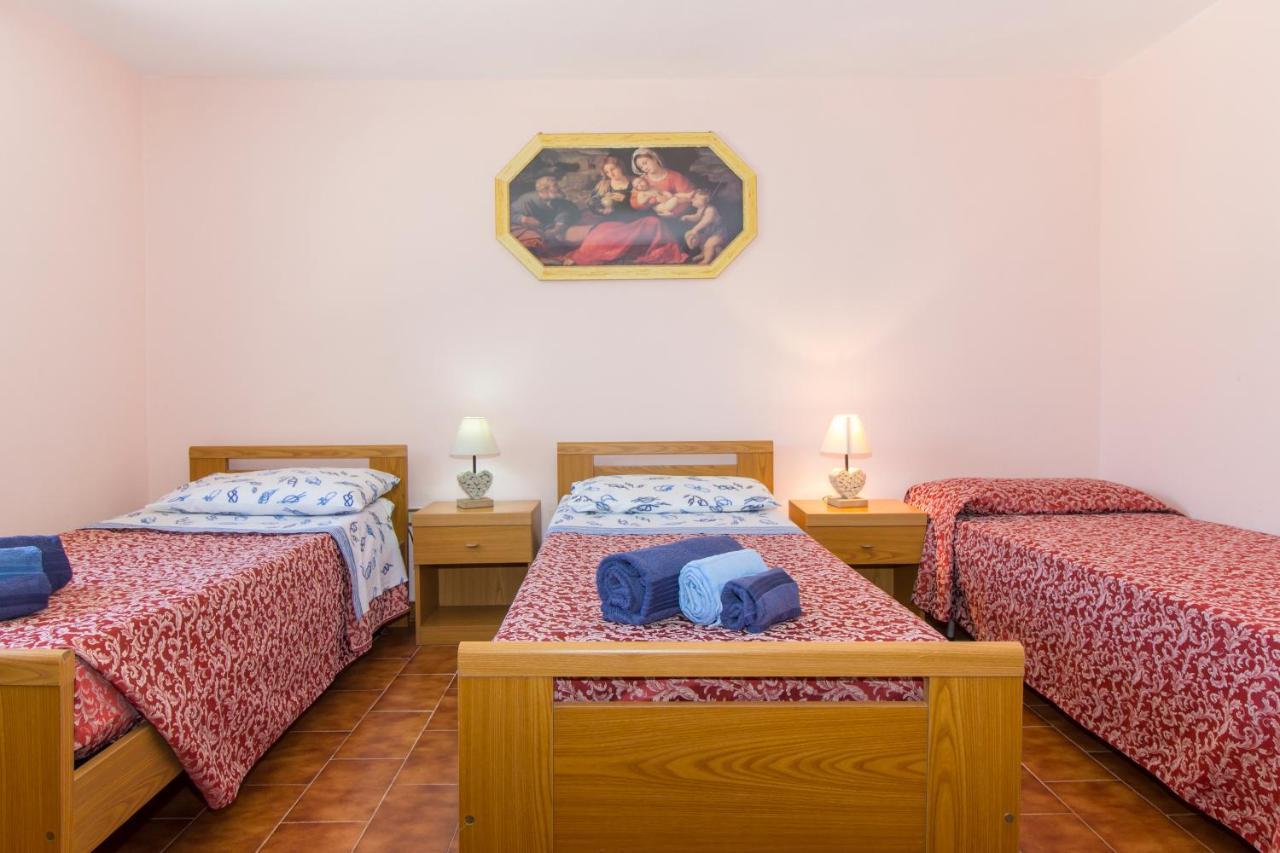 Appartamenti In Villa Con Ampio Giardino Esterno Posada Kültér fotó